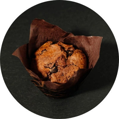 Chocolate muffin with chocolate chunks.