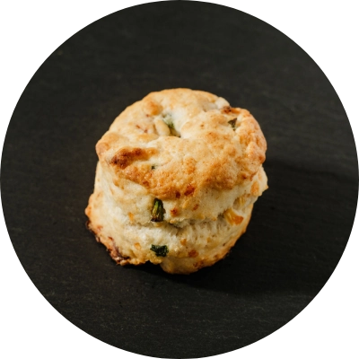 Savory scone with Black Forrest ham and Tillamook cheddar.